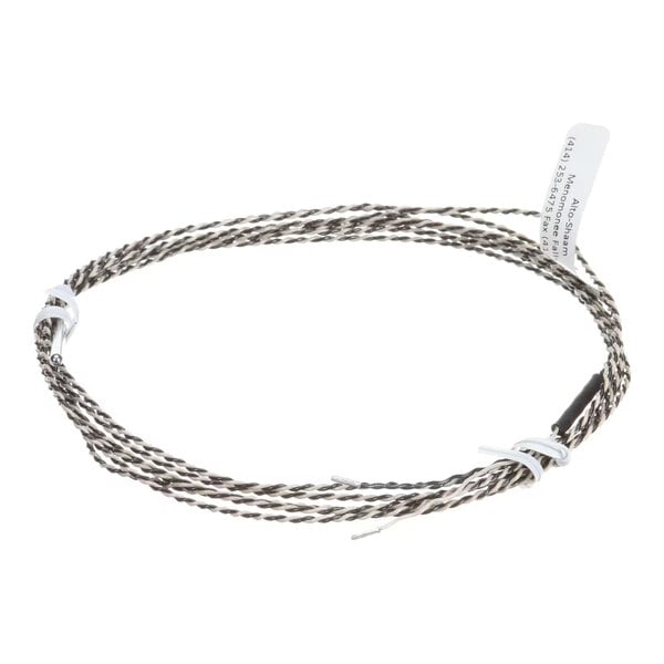 A coiled sensor wire with a tag attached, used for temperature measurement in Alto-Shaam equipment.