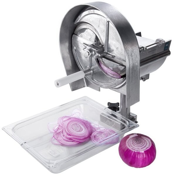 A Nemco Easy Slicer with onion slices on it.