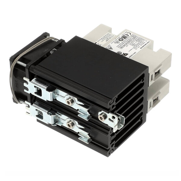 A close-up of a black and white BKI relay assembly.