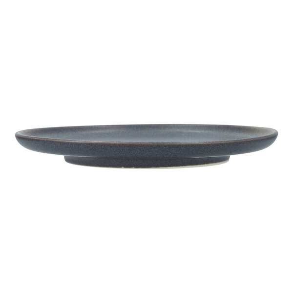 A Cloud Terre by Fortessa Iceland volcanic gray stoneware salad plate with a rim.
