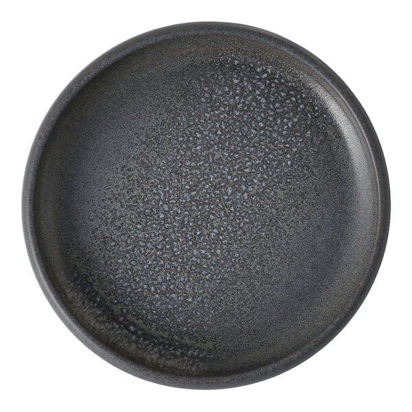 A Cloud Terre by Fortessa Iceland volcanic gray stoneware plate with a speckled texture.