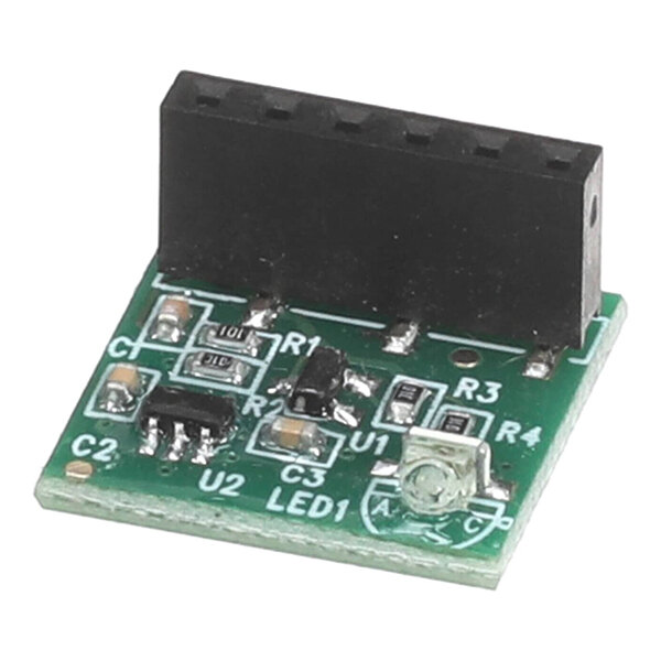 A close-up of a green Alto-Shaam daughterboard with black and white components.