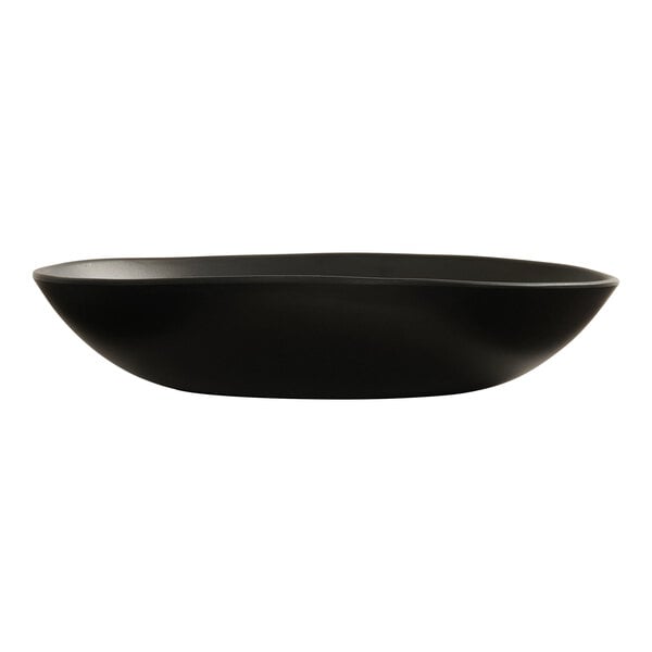 A large black melamine pasta bowl with a smooth, slightly irregular shape.