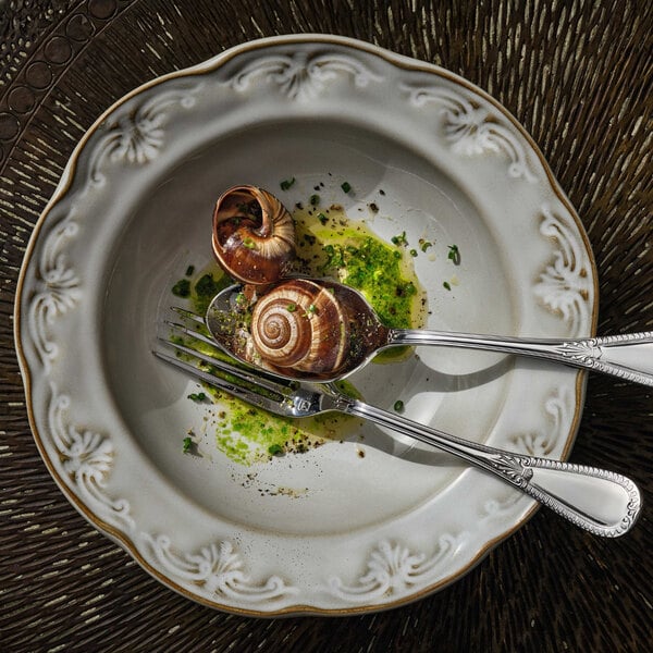 Manette Floral by Zwiesel Fortessa 18 oz. White Round Scalloped Stoneware Soup Plate with Embossed Floral Edge - 24/Case