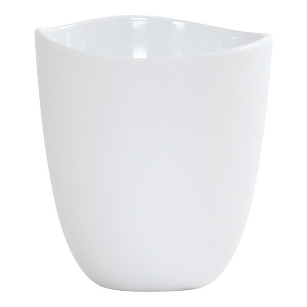 A white round melamine dressing crock with a 48 oz. capacity.
