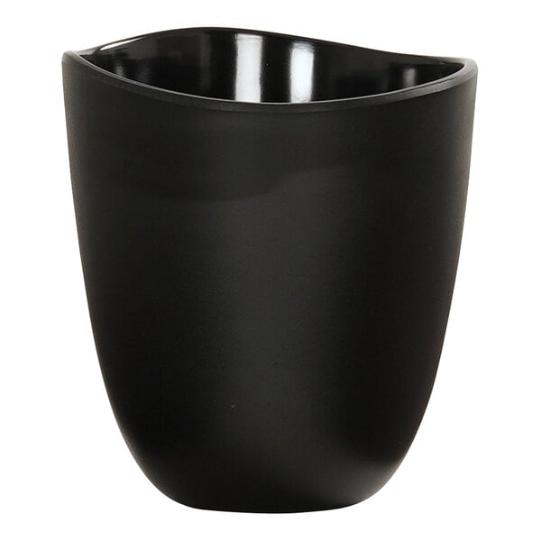 A black round melamine dressing crock with a smooth finish.