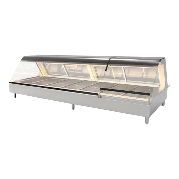 A large, stainless steel full-serve hot food merchandiser with seven wells and a glass display front.