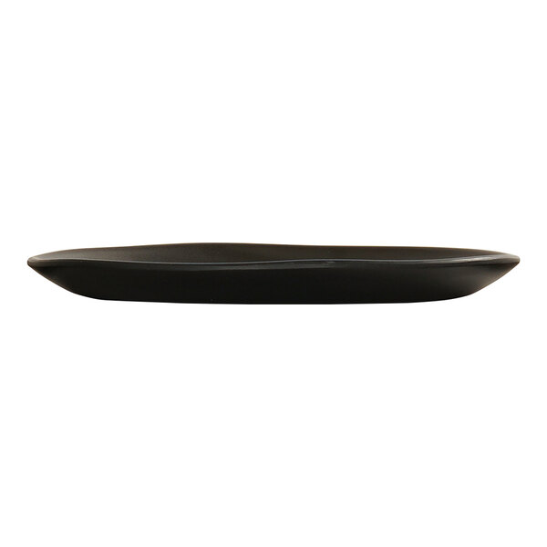 A black round melamine plate with a slightly irregular edge.