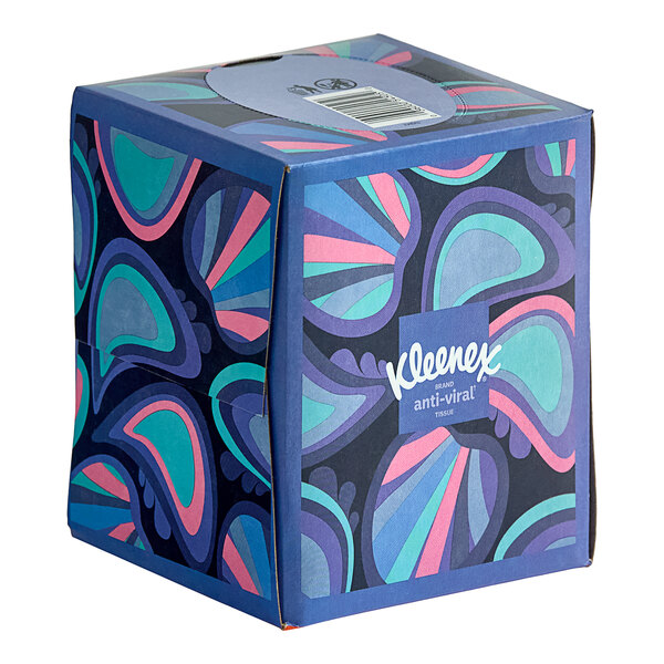 A Kleenex Anti-Viral tissue cube with a design on it.