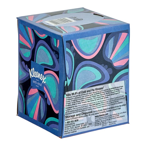 A Kleenex Anti-Viral facial tissue box with a design on it.