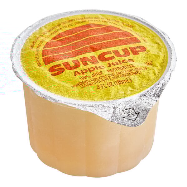 A SunCup plastic container filled with apple juice.
