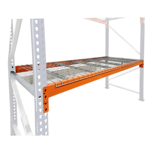 An orange heavy-duty bolted teardrop pallet rack add-on level with a wire deck.