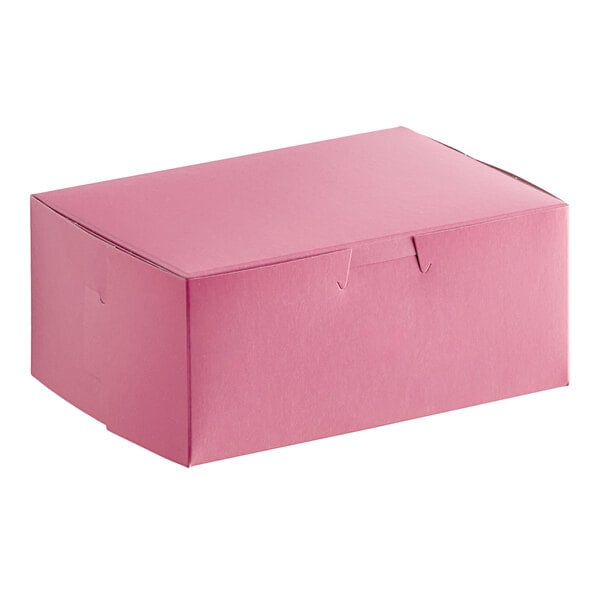 A pink Baker's Lane cake box with a lid.