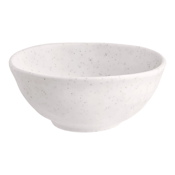 A small white round melamine bowl with a speckled pattern.