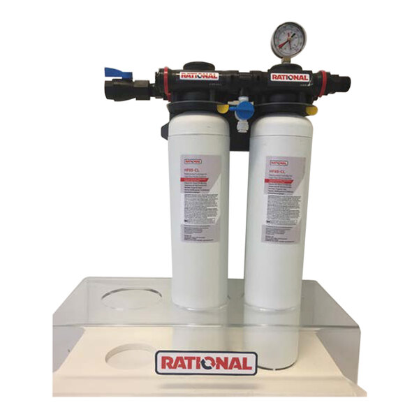 A Rational double unit water filter cartridge system on a stand with two water filters and a pressure gauge.