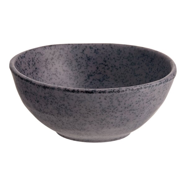 A small, round, dark gray melamine bowl with a speckled pattern.