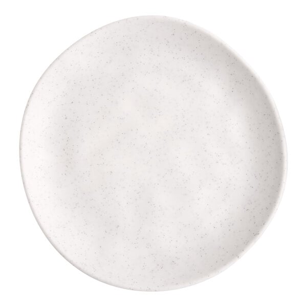 A white round melamine plate with a slightly irregular edge.