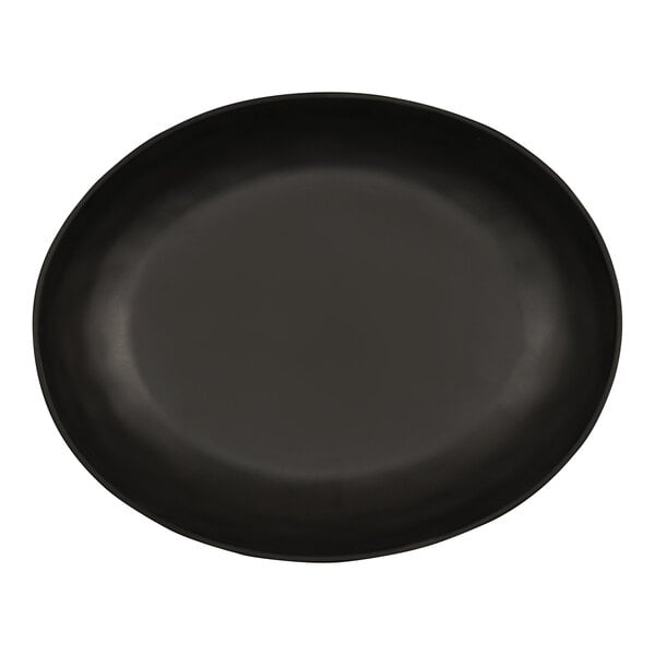 A black oval Cal-Mil melamine platter.