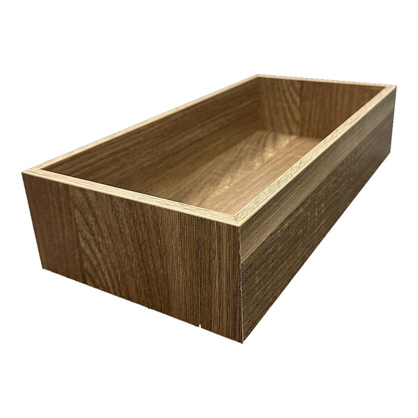 An Abert wood divider box on a table in a salad bar.