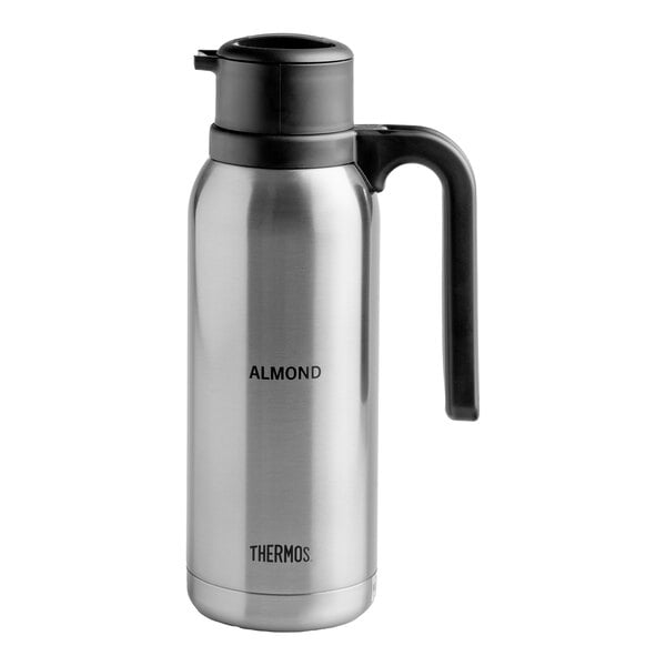 An almond stainless steel vacuum carafe by Arc Cardinal.