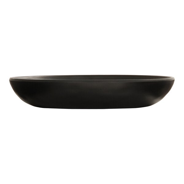 A matte black Cal-Mil melamine pasta bowl with a white stripe on the edge.