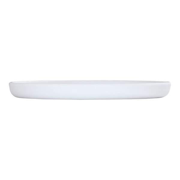 A Cal-Mil Carmel white melamine plate on a white surface.
