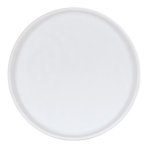 A Cal-Mil matte white melamine plate with a white border.