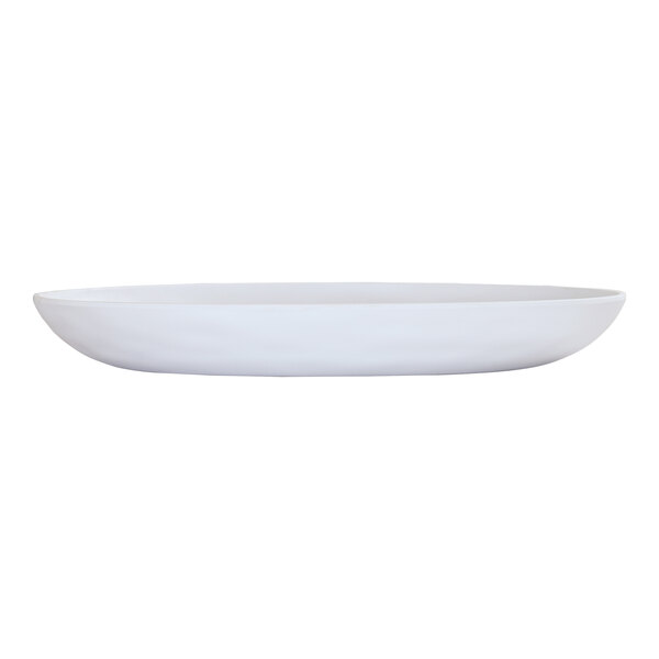 A Cal-Mil white oval melamine platter on a white surface.