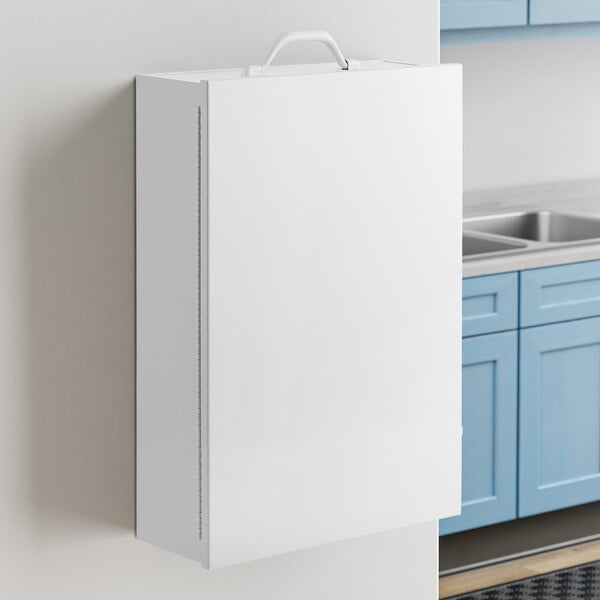 A white rectangular Medique first aid kit cabinet with a black border on the door.