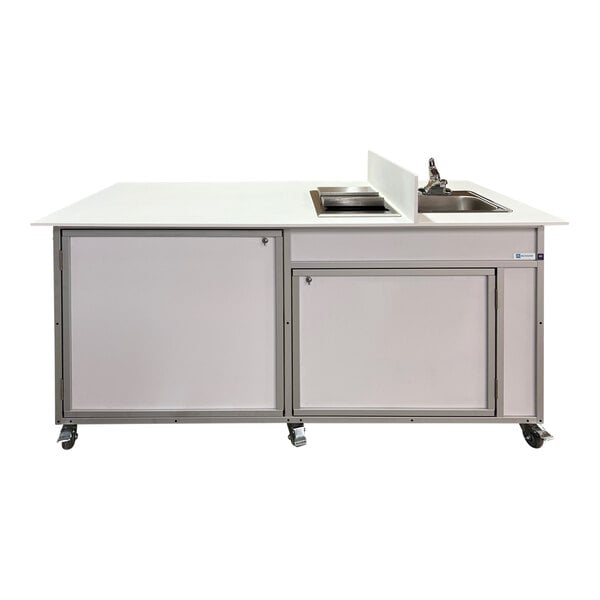 A white Monsam portable sink with an ice bin.