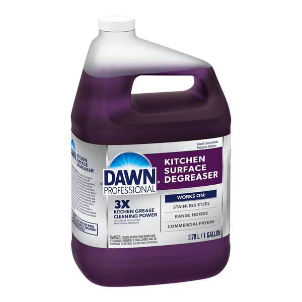 A purple Dawn Professional Kitchen Surface Degreaser bottle on a counter.