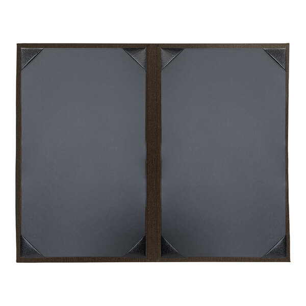 Two brown H. Risch, Inc. customizable menu covers with black album style corners on a wooden table.