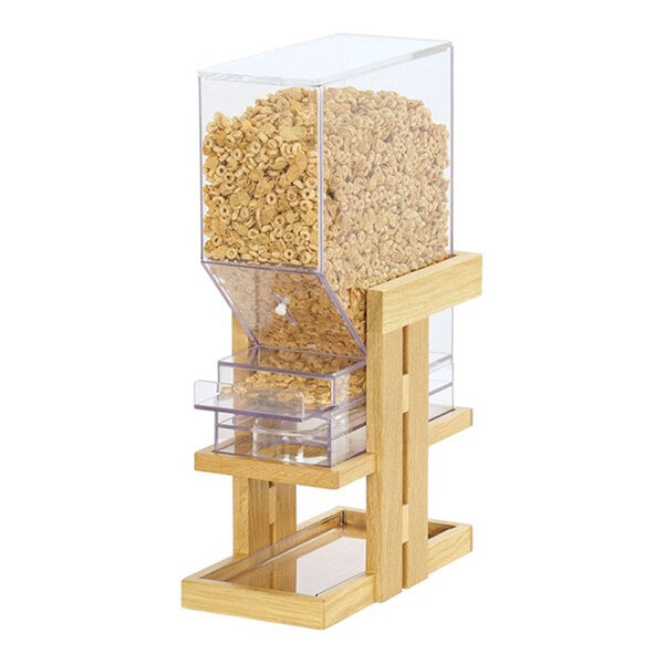 A single canister cereal dispenser with a clear container and oak wood stand.