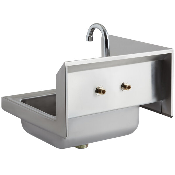 A stainless steel Regency wall-mounted hand sink with a faucet.