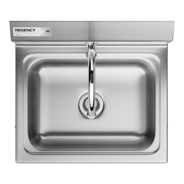A stainless steel Regency hand sink with pedestal base and faucet.