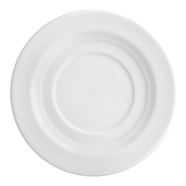 An Arcoroc white porcelain double well saucer with a circular rim.