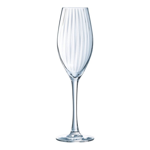 A close-up of an Arcoroc Serena wine flute filled with water.