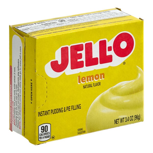 A yellow box of JELL-O Instant Lemon Pudding mix on a counter.