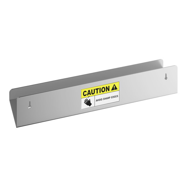 A stainless steel shower shelf with a satin finish and a caution label on the front.