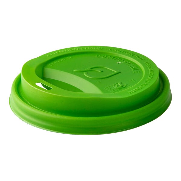 A green compostable plastic sip lid designed for 8 oz. hot cups.