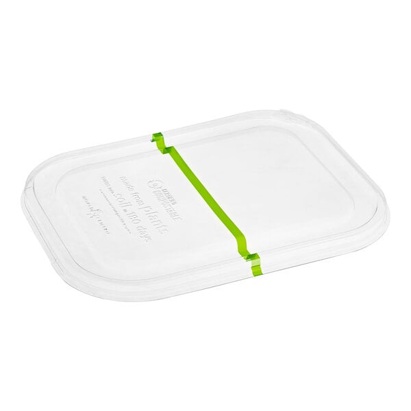 A clear plastic lid with a green stripe.