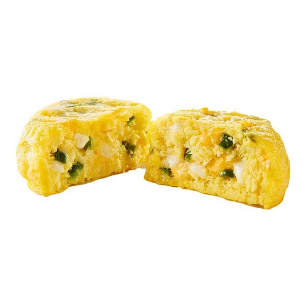 Two Papetti's cheese and jalapeno egg bites on a white background.