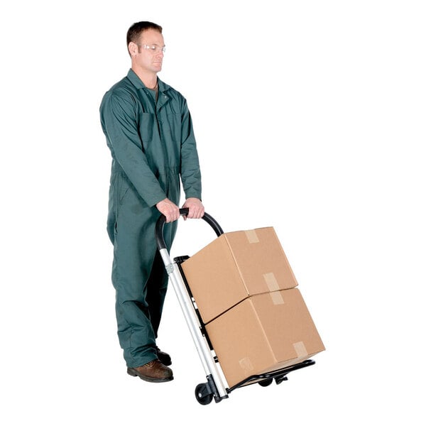 A person in work attire using a Vestil aluminum 2-step folding ladder cart to transport two cardboard boxes.