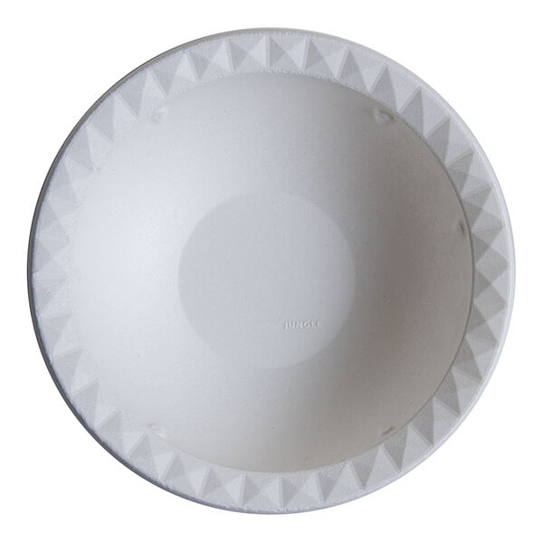 A white Jungle Decor bowl with a diamond pattern on it.