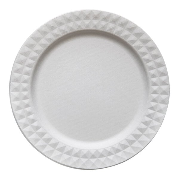 A close up of a white Jungle Decor sugarcane pulp plate with a diamond pattern.