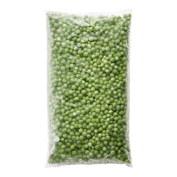 A sealed plastic bag filled with individually quick frozen organic green peas.