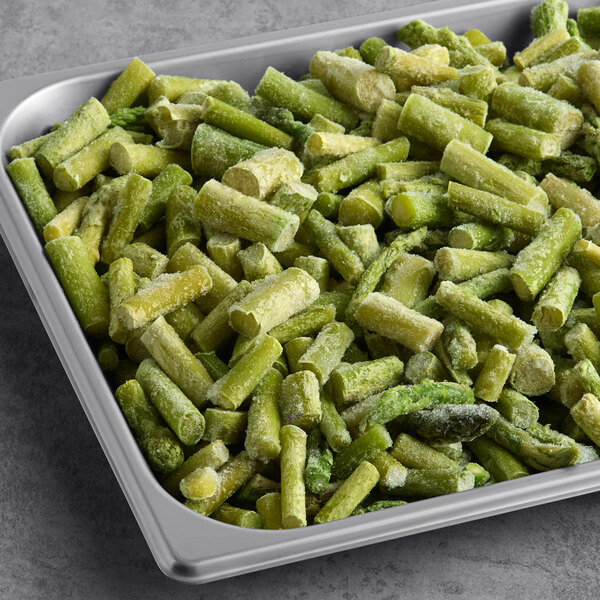 A tray of frozen asparagus cuts and tips.