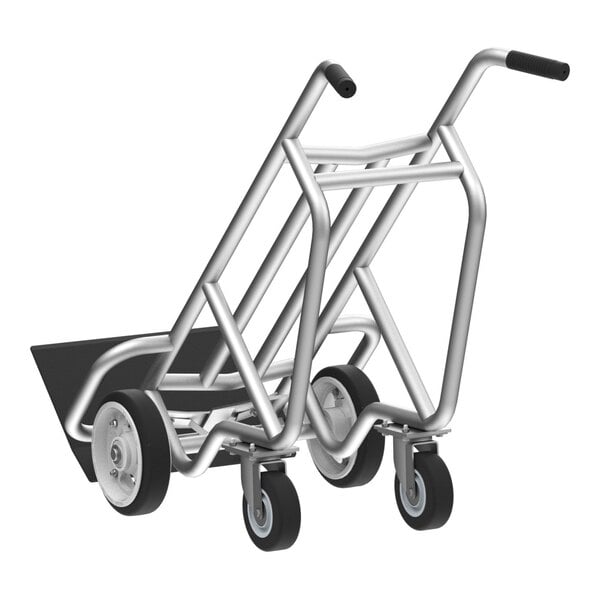A heavy-duty aluminum hand truck with four solid rubber wheels and a sturdy frame.