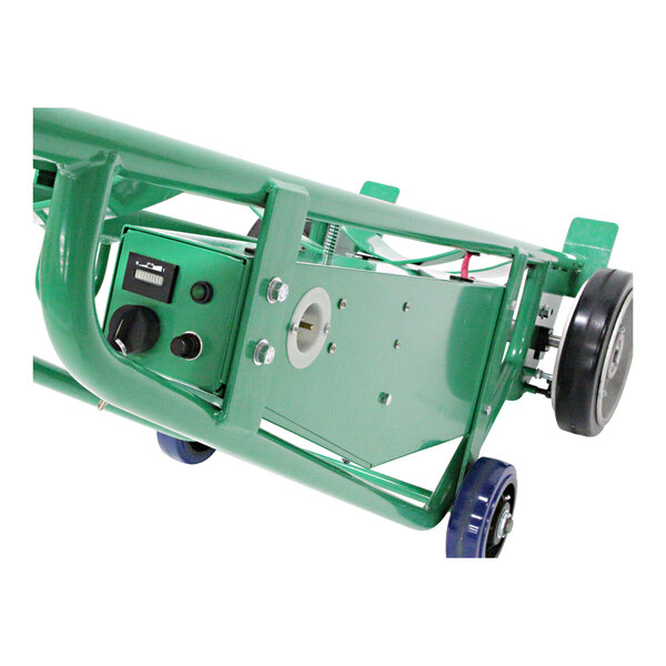 A green battery-powered steel drum truck with four wheels, a control panel, and a security cable chime hook.