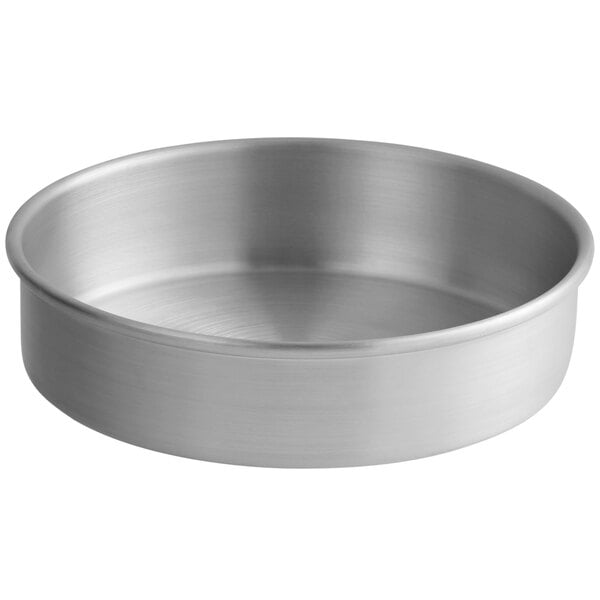 A silver round metal Choice cake pan.